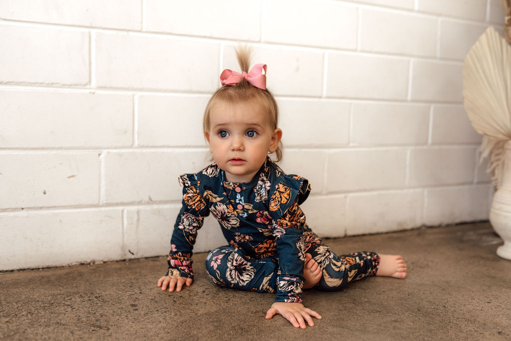 The Adorable deep blue & flower, Belle Organic Growsuit onesie is functional, soft and stretchy with foldable hand & foot mittens to keep your little Princess cosy.