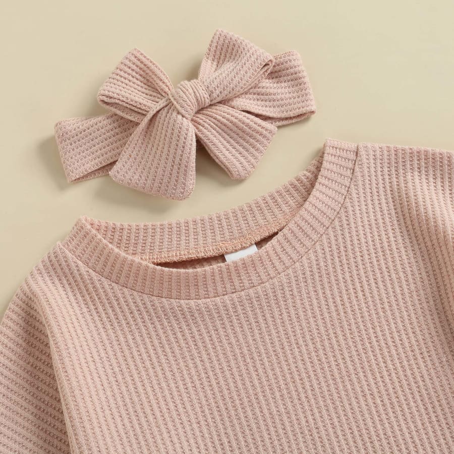 This set includes a long sleeve light weight jumper & matching nappy cover in a Gorgeous Blush colour. Perfect for all year round when styled with pants for the chillier months.