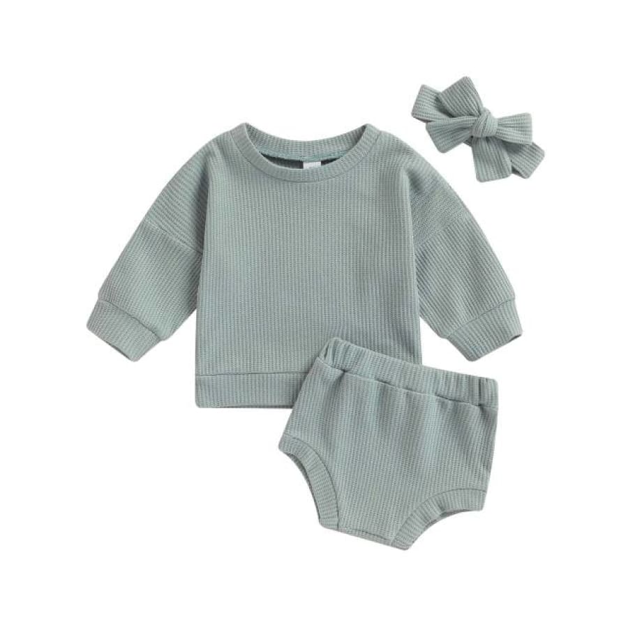 This set includes a long sleeve light weight jumper & matching nappy cover in a Gorgeous Sage colour. Perfect for all year round when styled with pants for the chillier months.