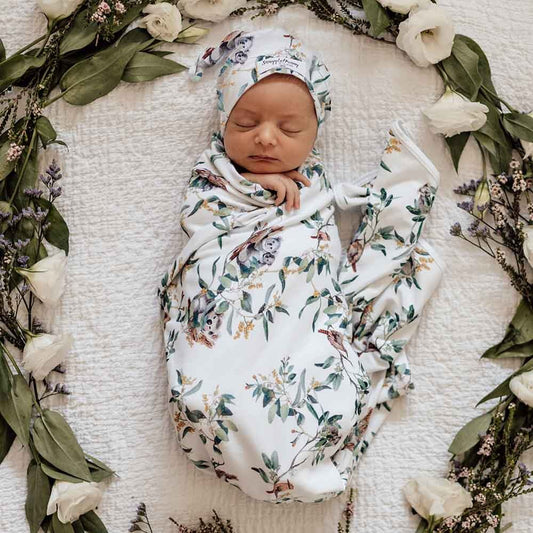 Beautiful Eucalypt design baby jersey wrap & matching beanie set. 