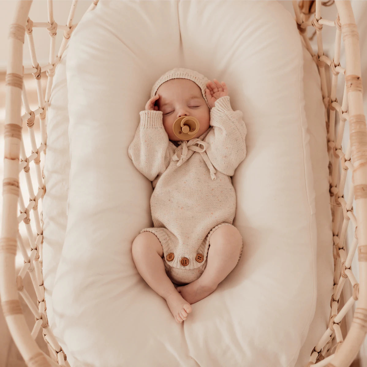 Adorable knitted romper in an oatmeal fleck colour. This is designed to be an heirloom piece. Perfect for Baby Welcome Photos