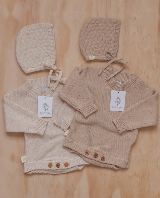 Adorable knitted romper in an oatmeal fleck colour. This is designed to be an heirloom piece. Perfect for Baby Welcome Photos