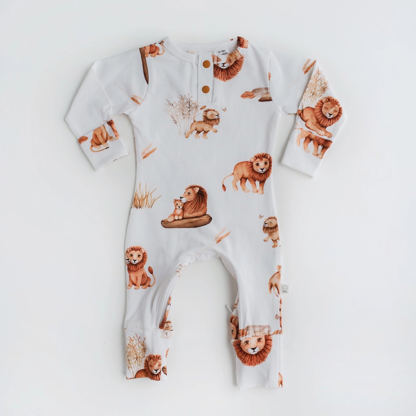 This Lion Growsuit in white organic fabric with adorable lions design. Matching Beanie can be bought separately