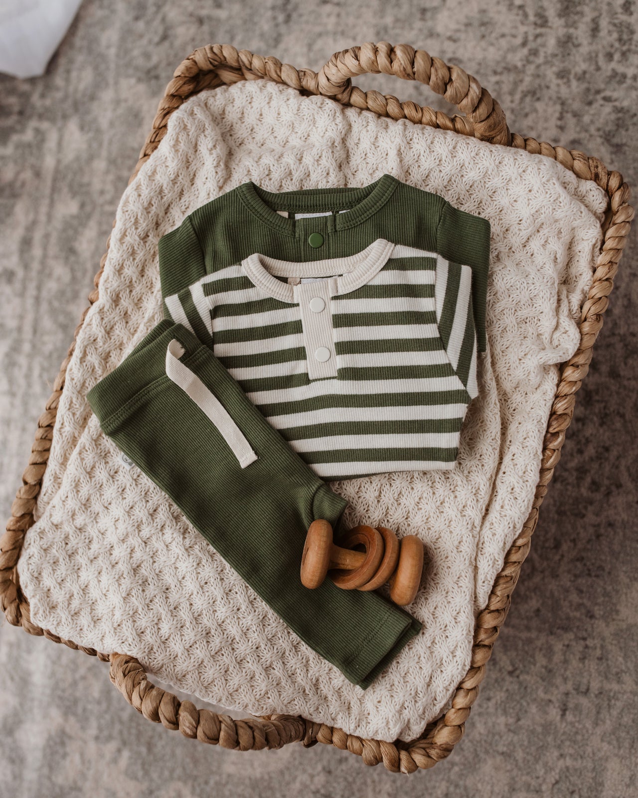 Olive pants shown with both the olive Bodysuits & olive stripe bodysuit