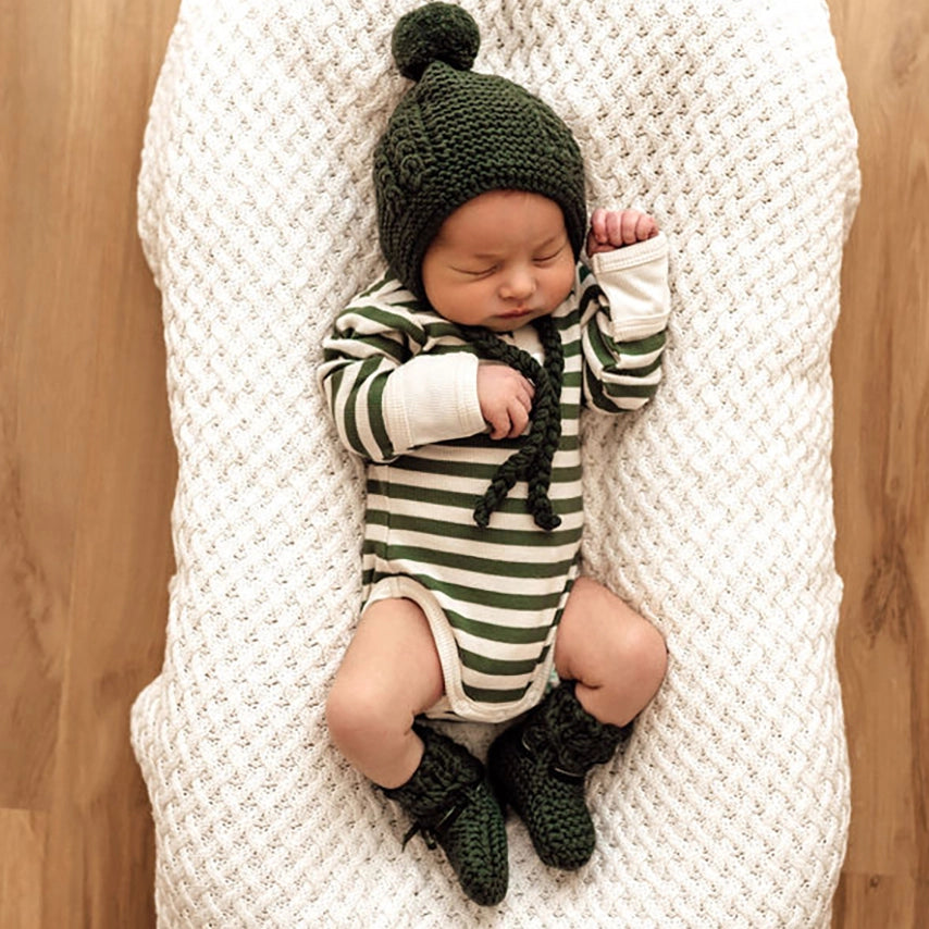 Olive stripe bodysuit in stretch rib fabric, shown with olive merino wool bonnet & booties set