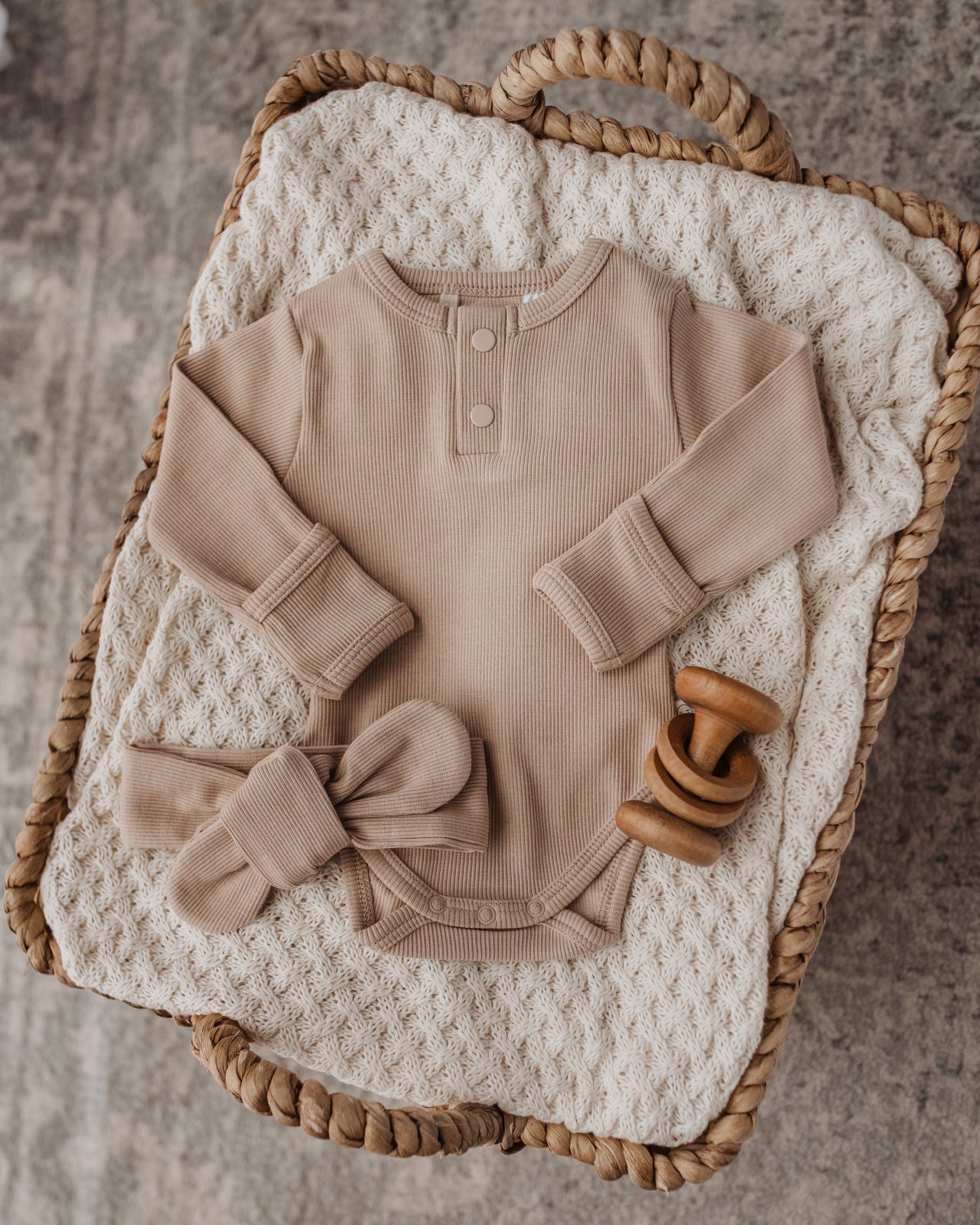 Long sleeve bodysuit in Pebble colour with matching top knot (sold separately)