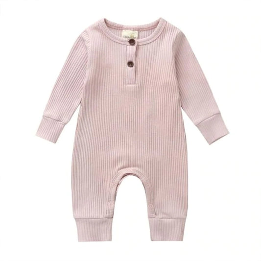 Pale pink baby & toddler Jumpsuit in a ribbed fabric.