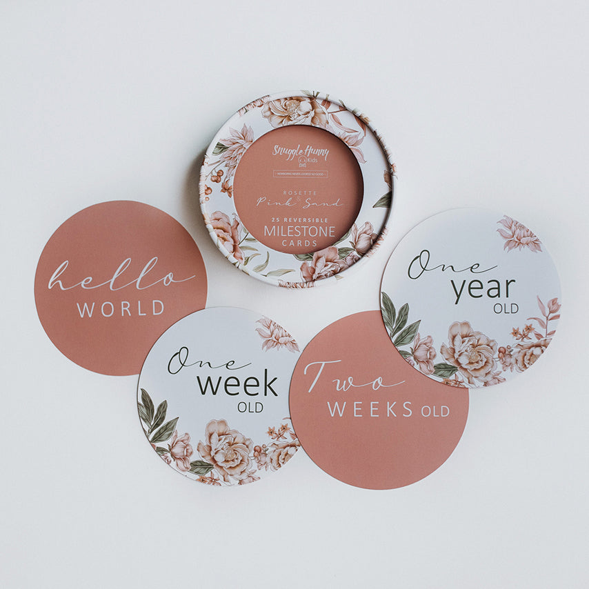 The Rosette & Pink sand reversible milestone cards, featuring Hello World, One Week old, Two Weeks old & One Year old cards